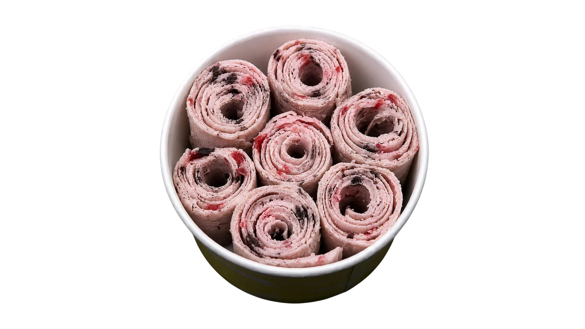 Two-flavor rolled ice cream served in a cup Two-flavor rolled ice cream served in a cup